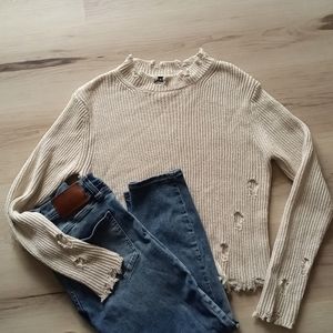 Sweater size small with factory holes